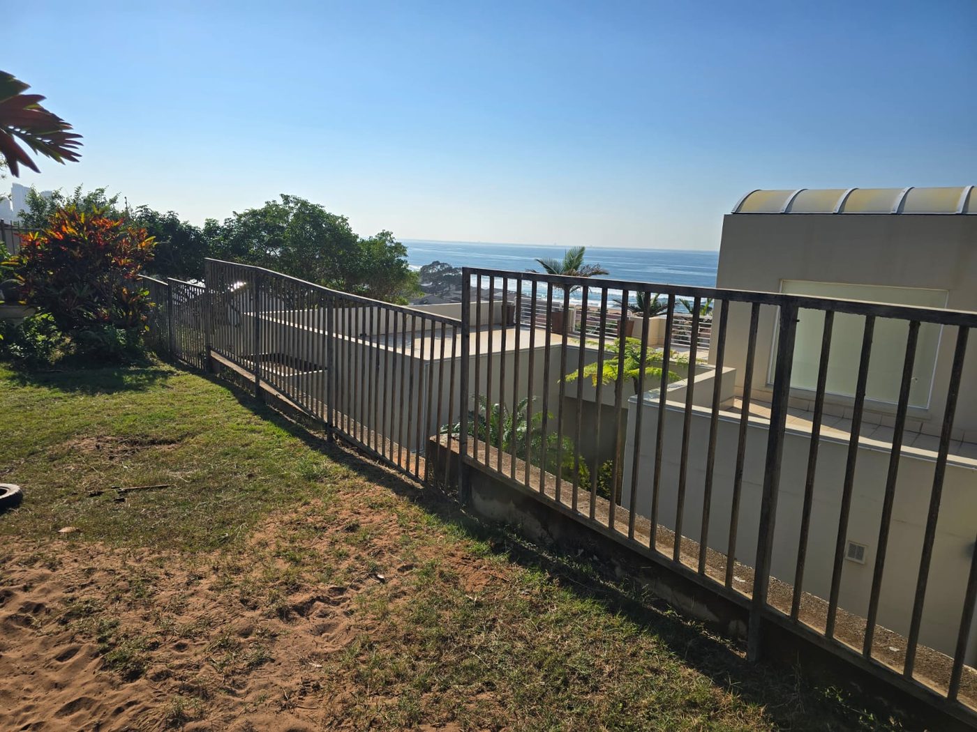 Rusted steel balustrade fence before replacement
